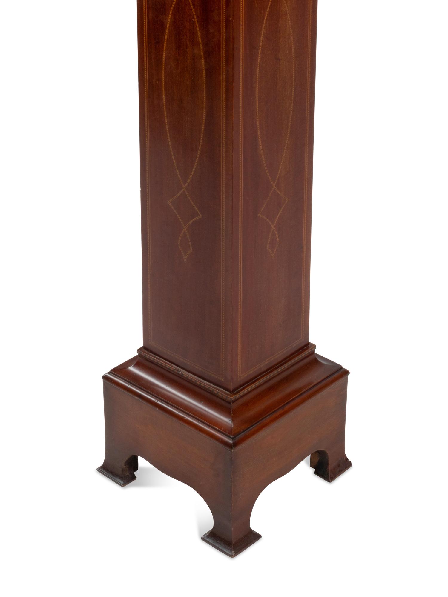 An Italian Marble Bust with an Associated Line-Inlaid Mahogany Pedestal