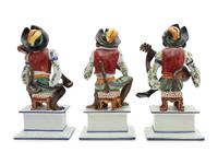 A Set of Three Italian Majolica Monkey Band Figures