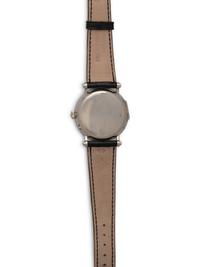 PATEK PHILIPPE, REF. 5015 PLATINUM MOONPHASE WATCH