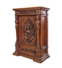 A Pair of Renaissance Revival Carved Walnut Marble-Top Cabinets