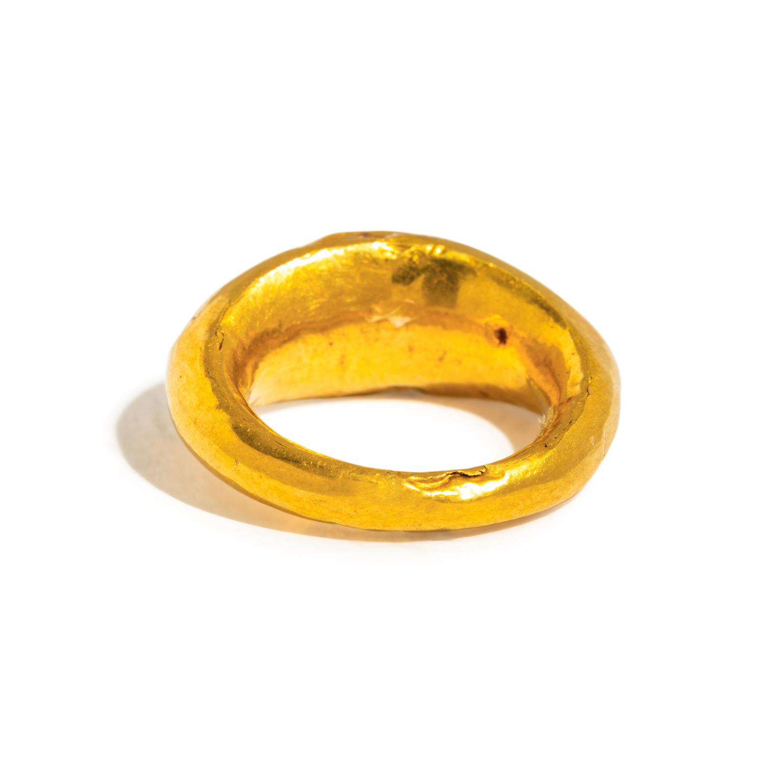 A Roman Gold and Carnelian Finger Ring with a Male Portrait Head