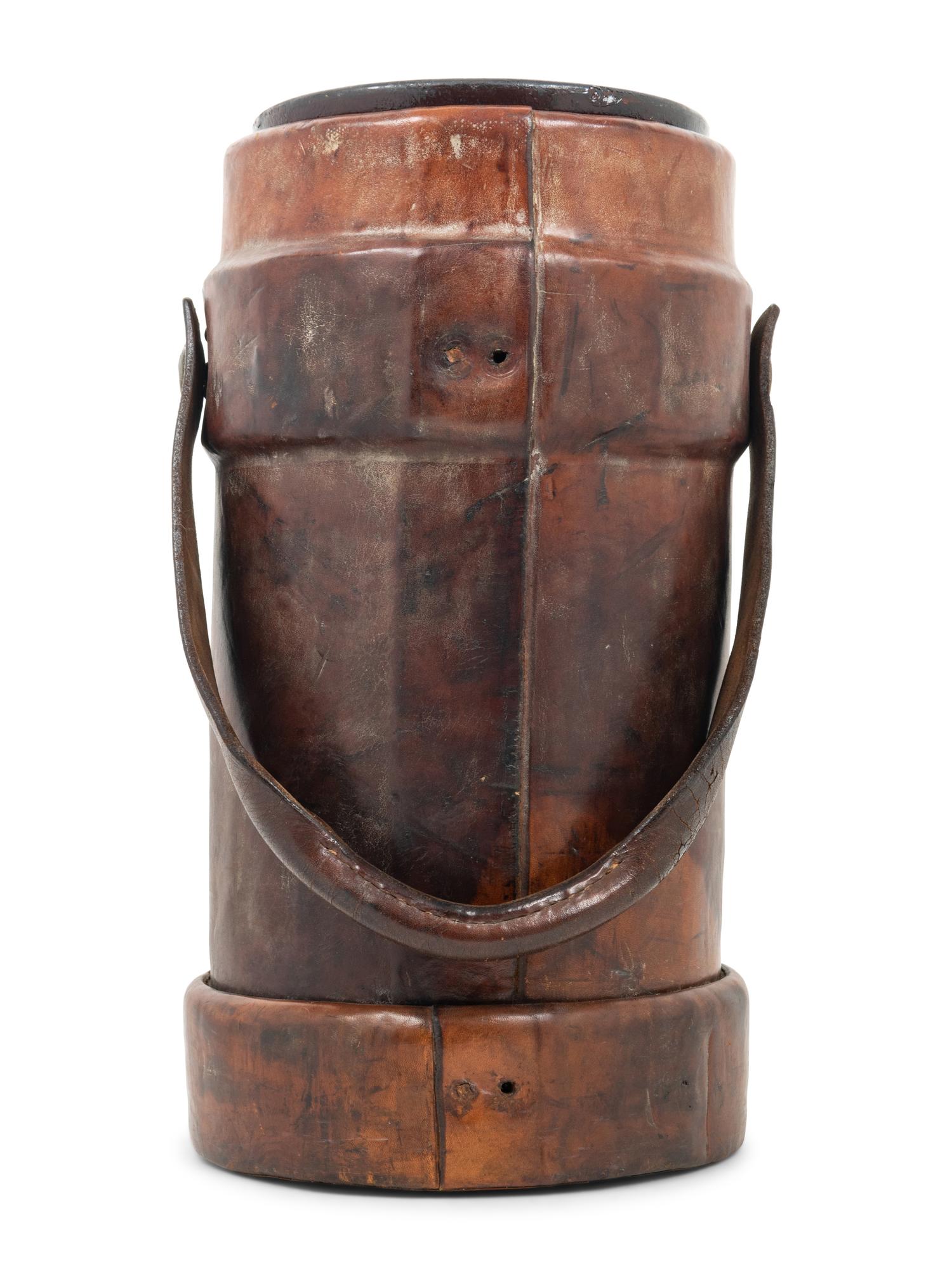 A WWI British Royal Navy Leather Artillery Bucket with an Associated American Indurated Fiber Liner