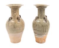 A Pair of Celadon Glazed Vases Height 13 1/2 inches. — SU-TANG DYNASTY (581-907 C.E.)