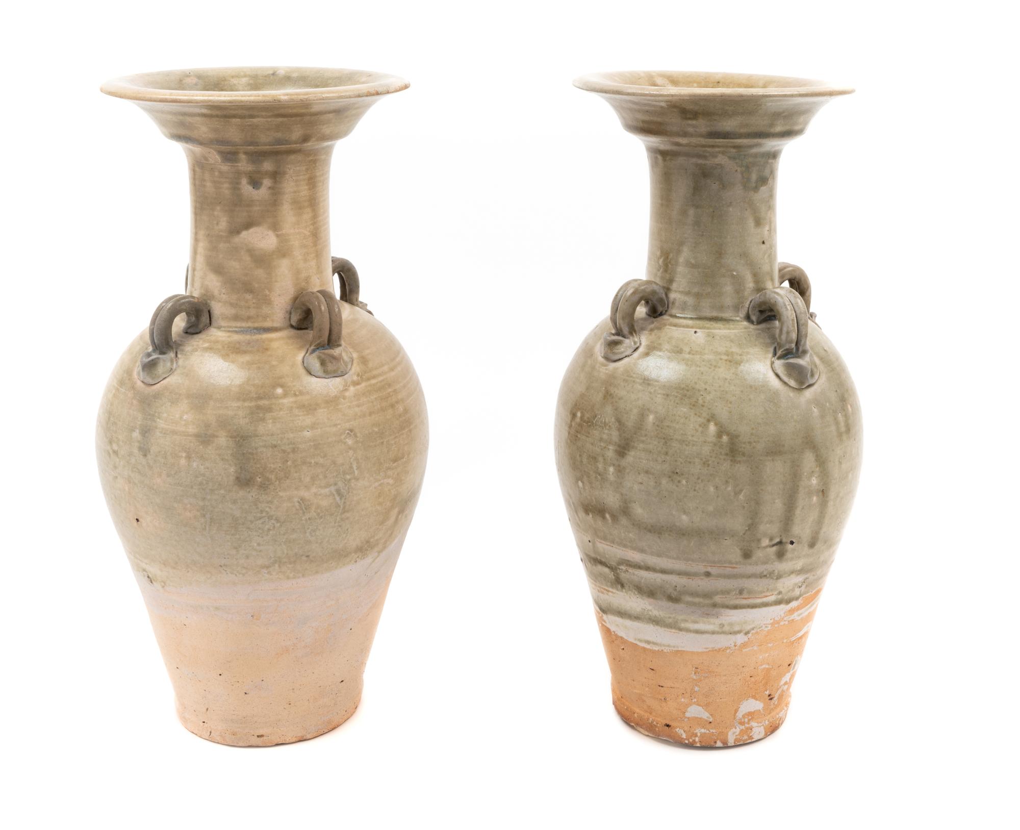 A Pair of Celadon Glazed Vases Height 13 1/2 inches. — SU-TANG DYNASTY (581-907 C.E.)