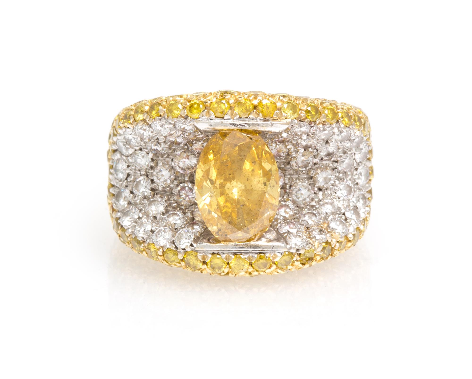 A 19 Karat Gold, Fancy Color Diamond and Diamond Ring, 11.00 dwts.