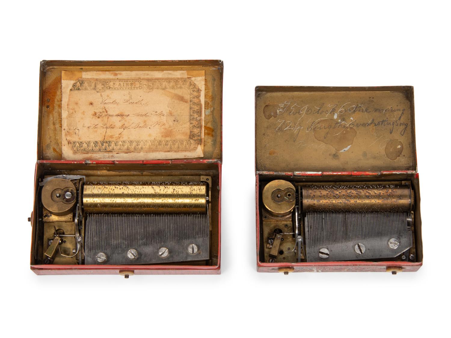 Two Music Boxes in Tin Transfer Cases