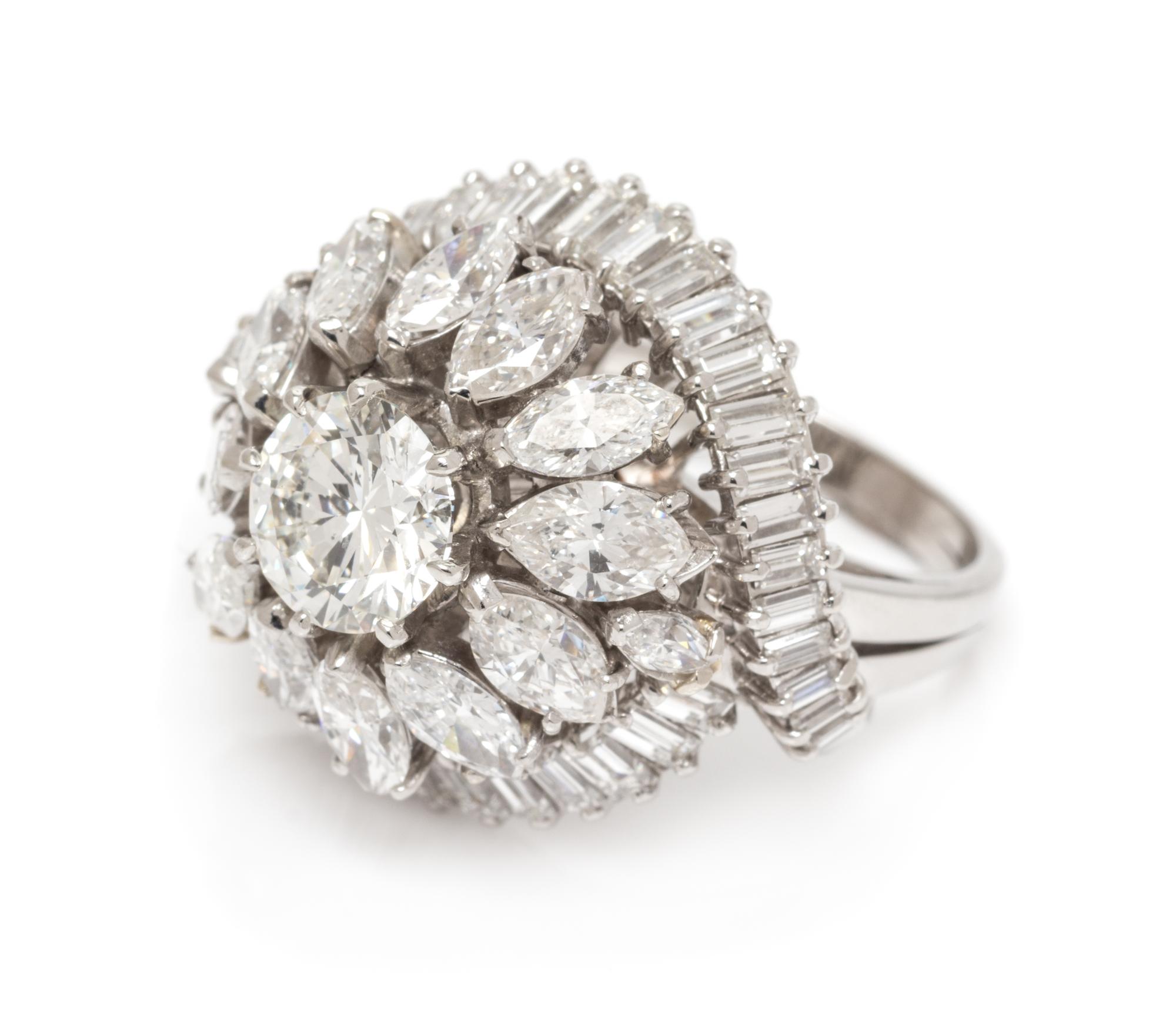 A Platinum and Diamond Bombe Ring, 11.80 dwts.