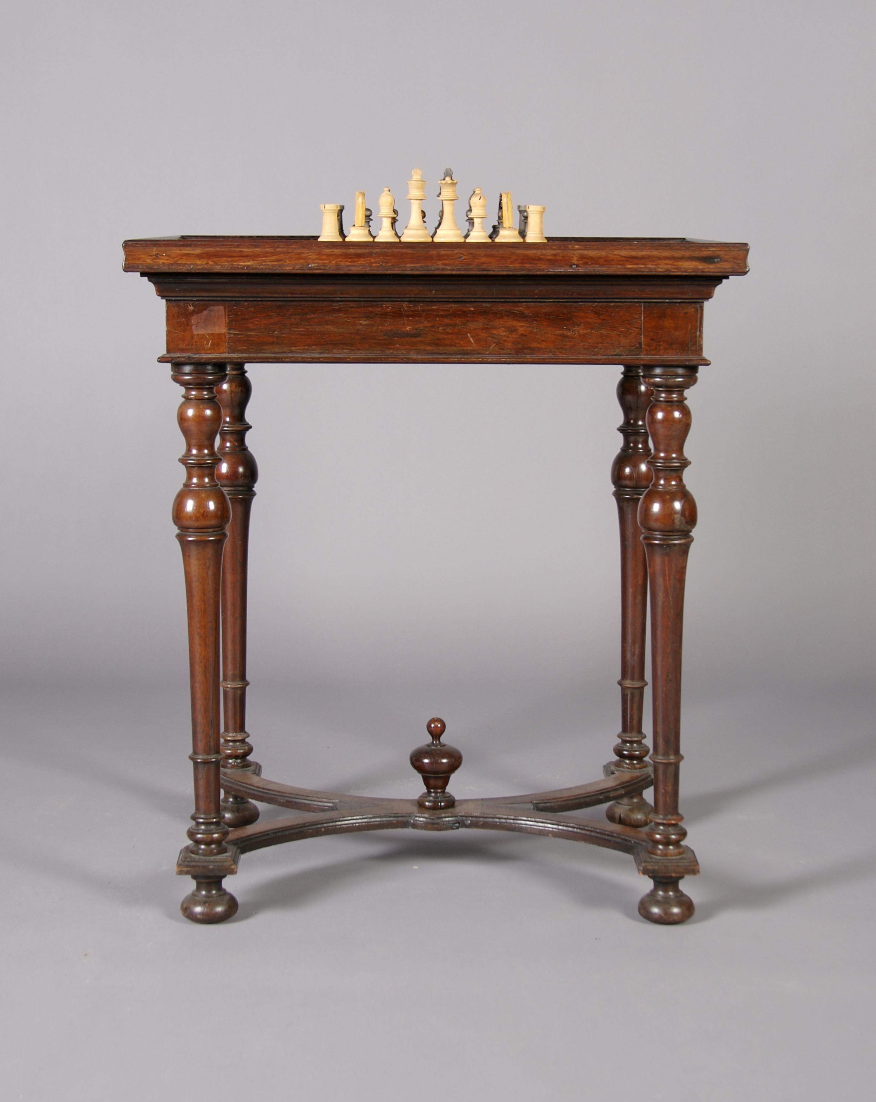 An English Mahogany Work/Games Table, Height 28 1/2 x width 25 x depth 19 3/4 inches.