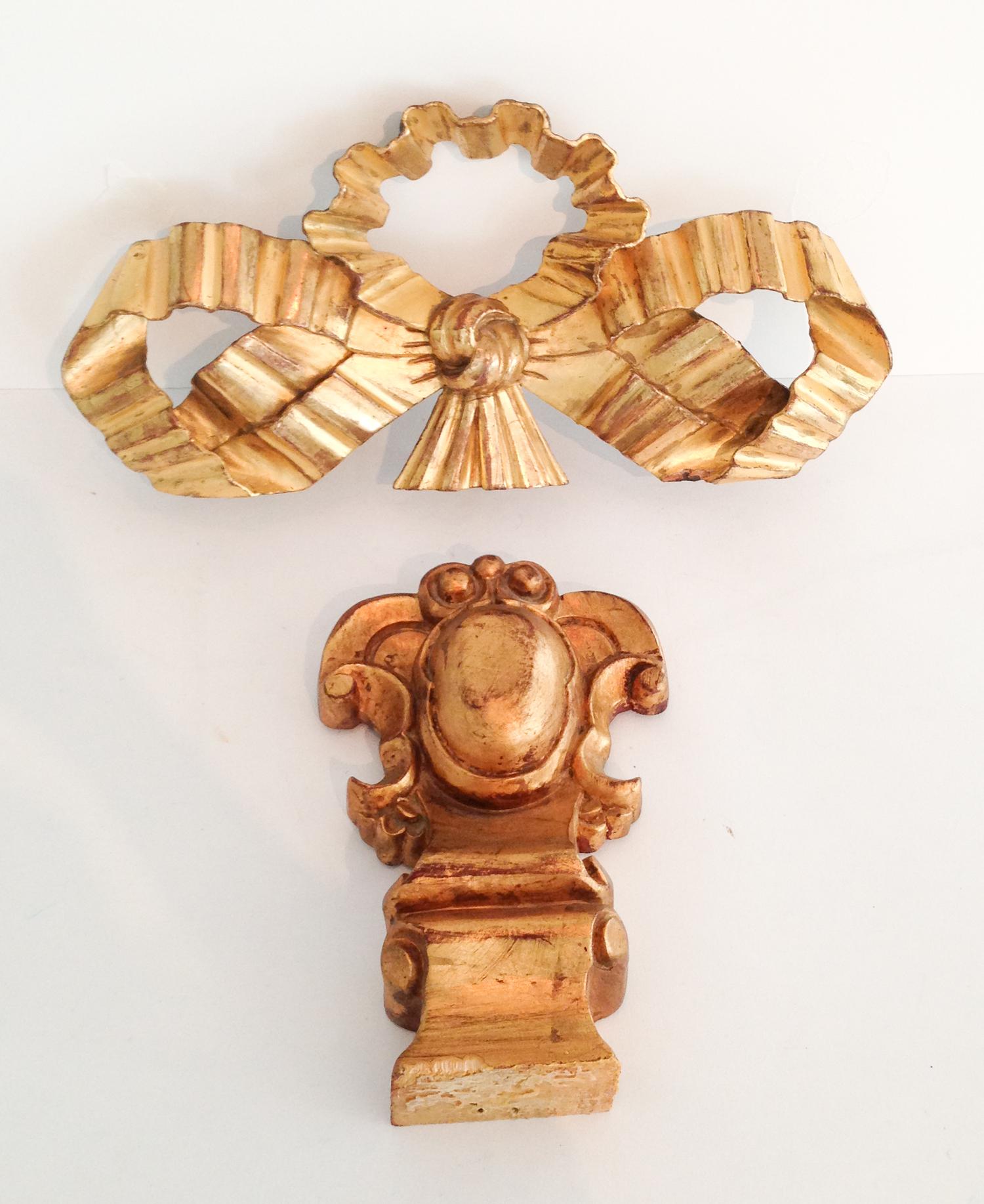A Group of Three Gilt Painted Wall Mounts Height of tallest 11 1/2 inches.