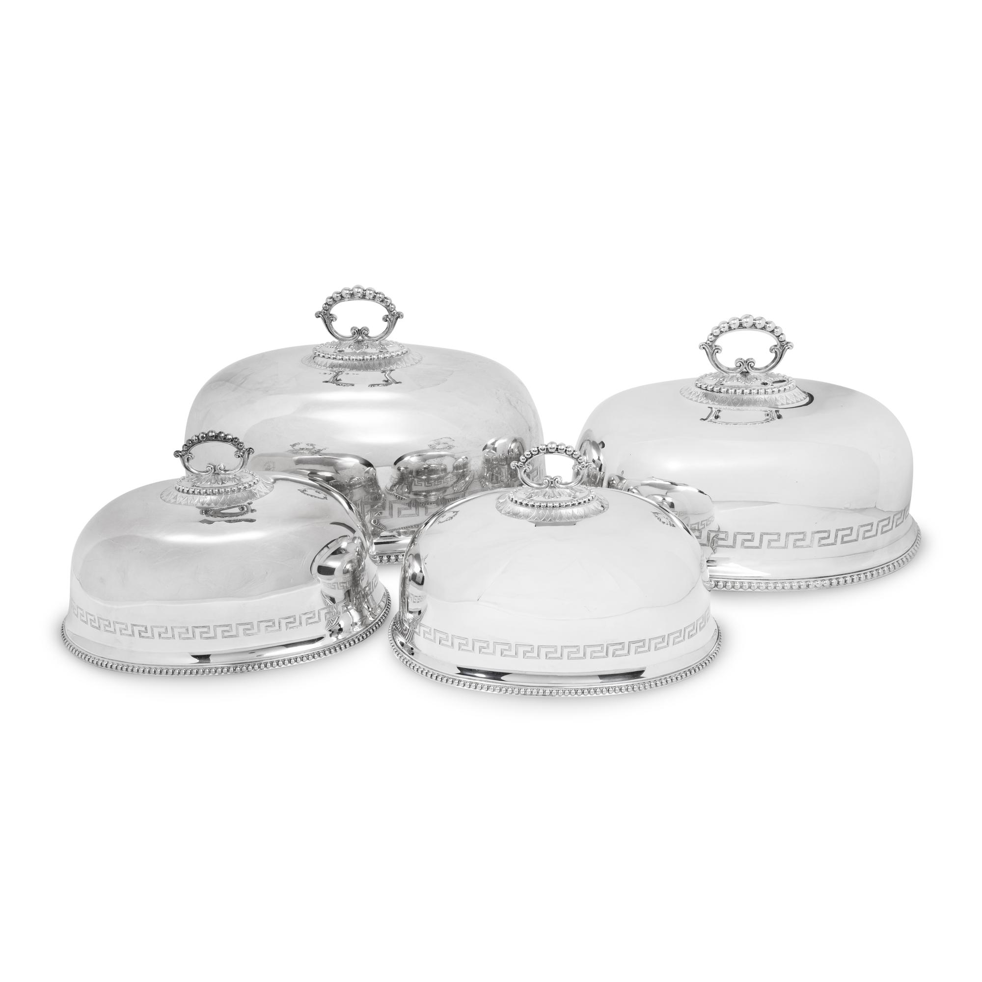 A Set of Four English Silver-Plate Cloches