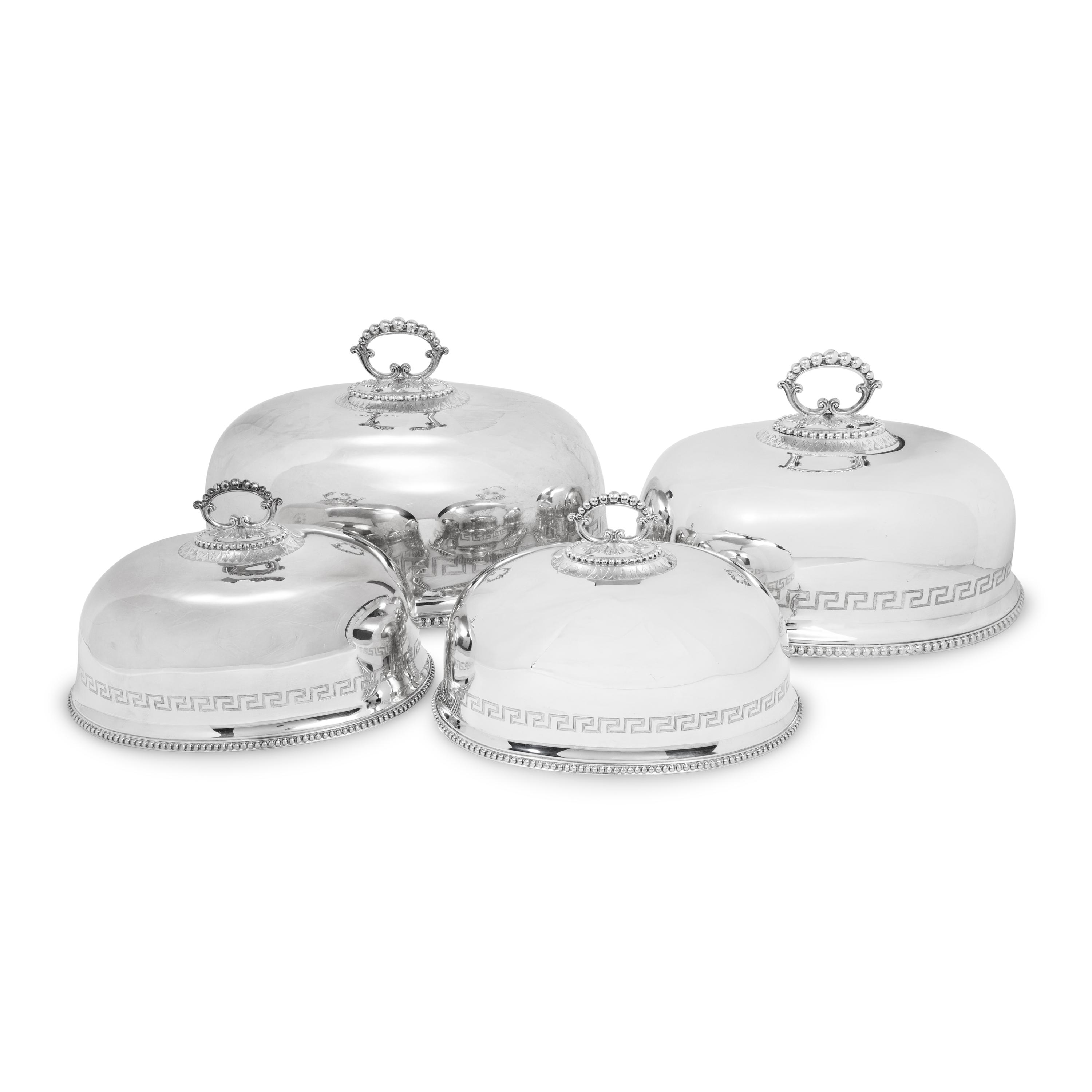 A Set of Four English Silver-Plate Cloches