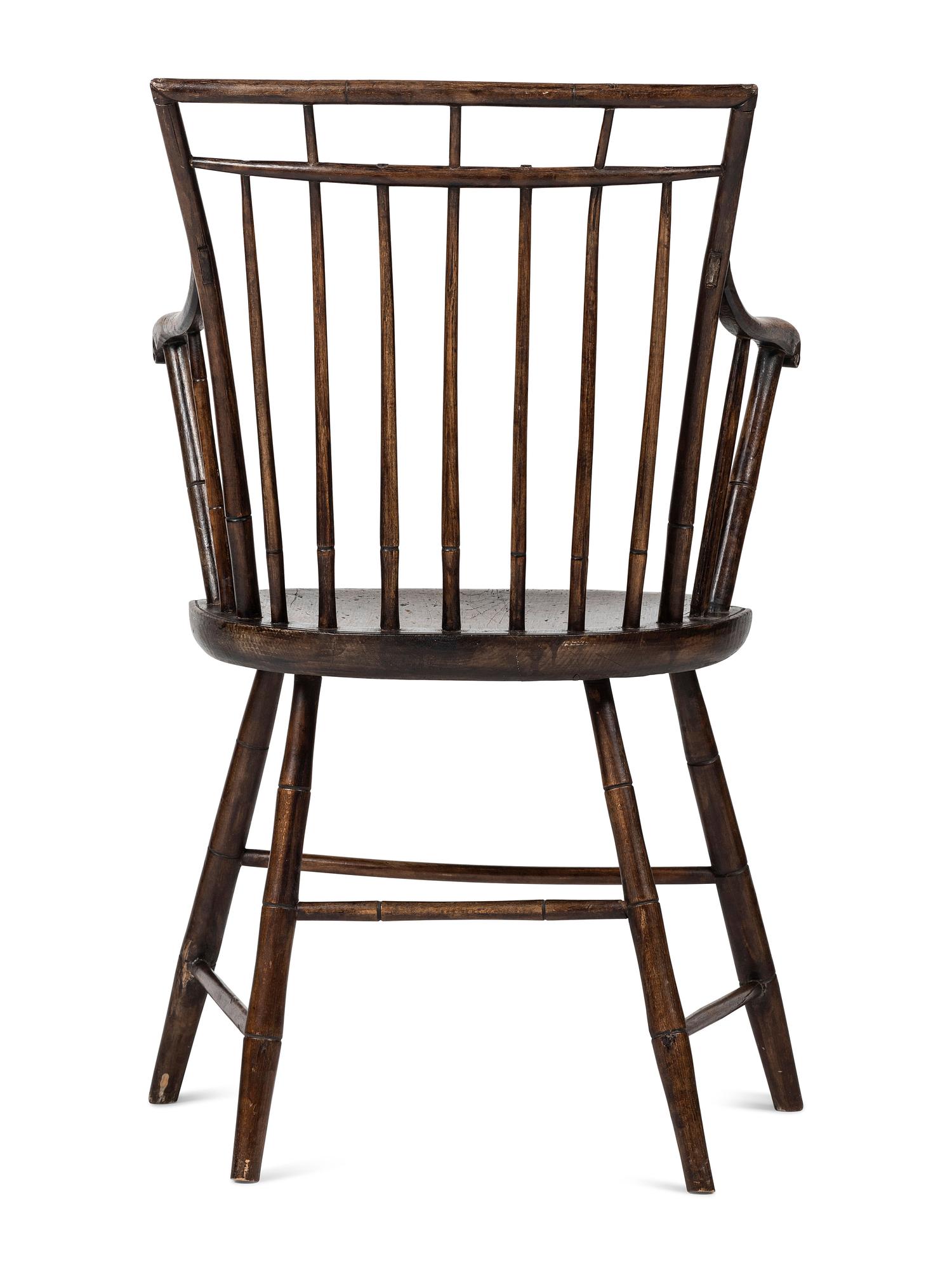 A Birdcage Windsor Scroll-Carved Armchair
