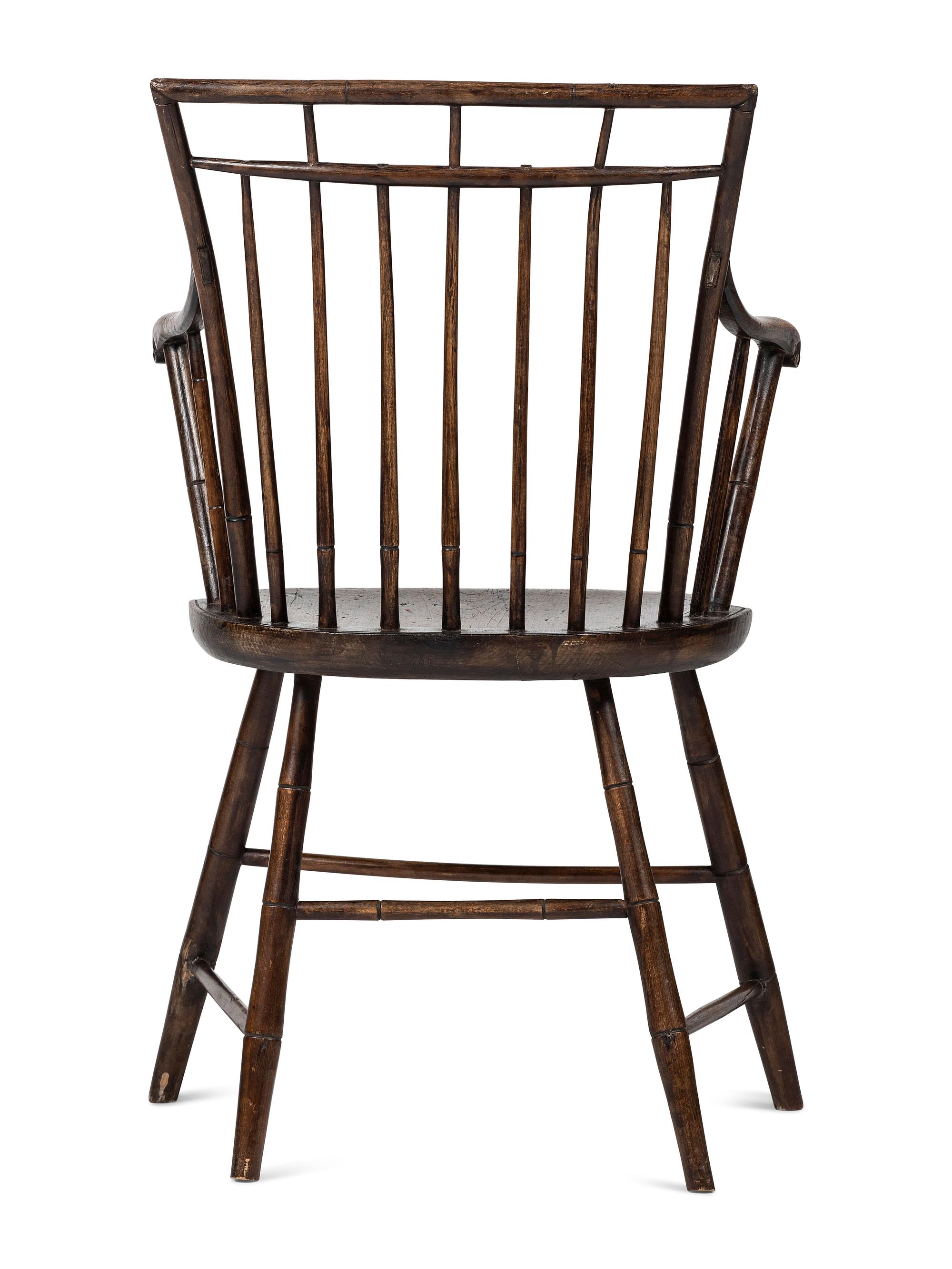 A Birdcage Windsor Scroll-Carved Armchair
