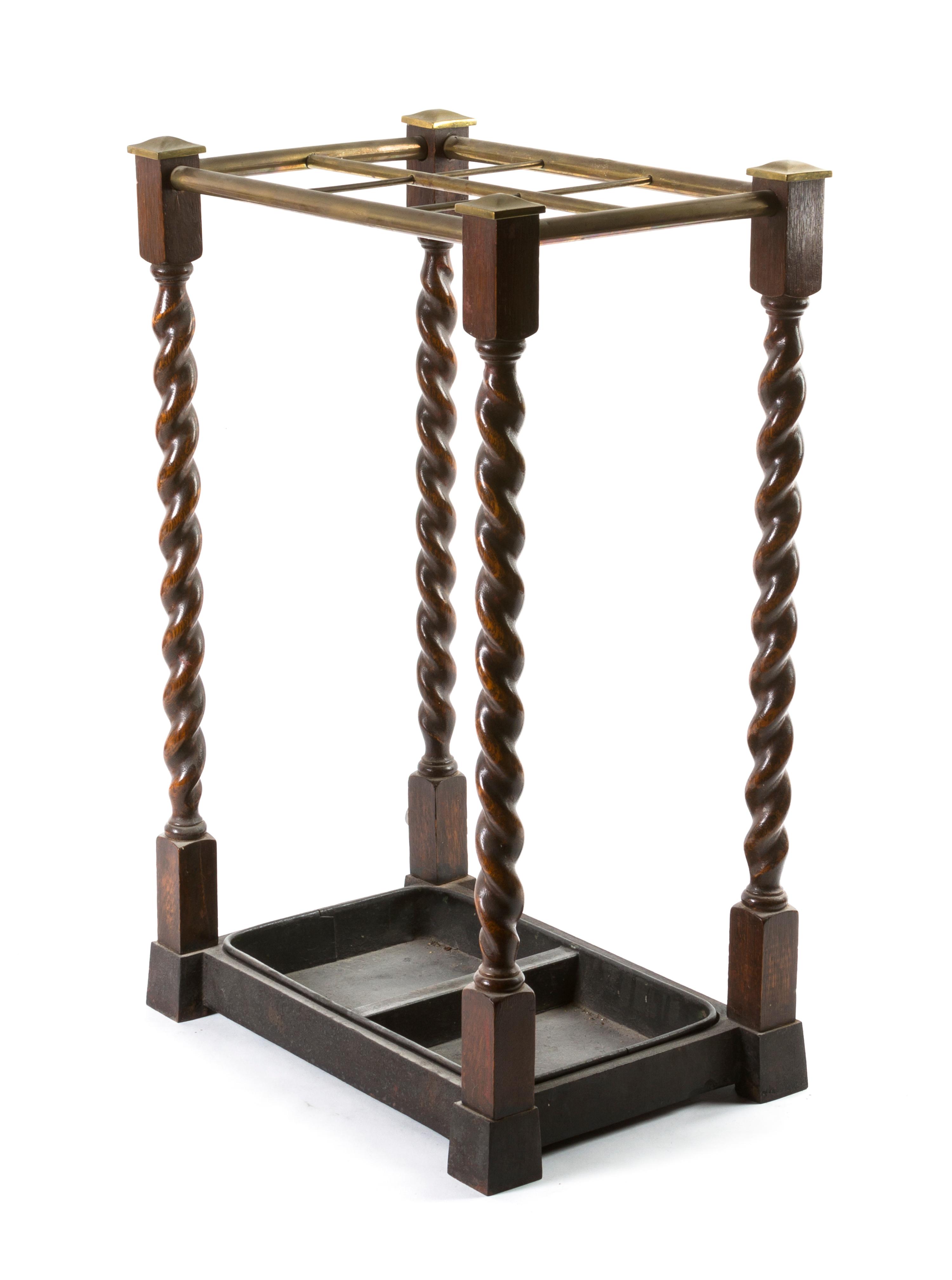 An Oak and Brass Mounted Cane Stand, Height 23 3/4 x width 15 x depth 10 1/8 inches.