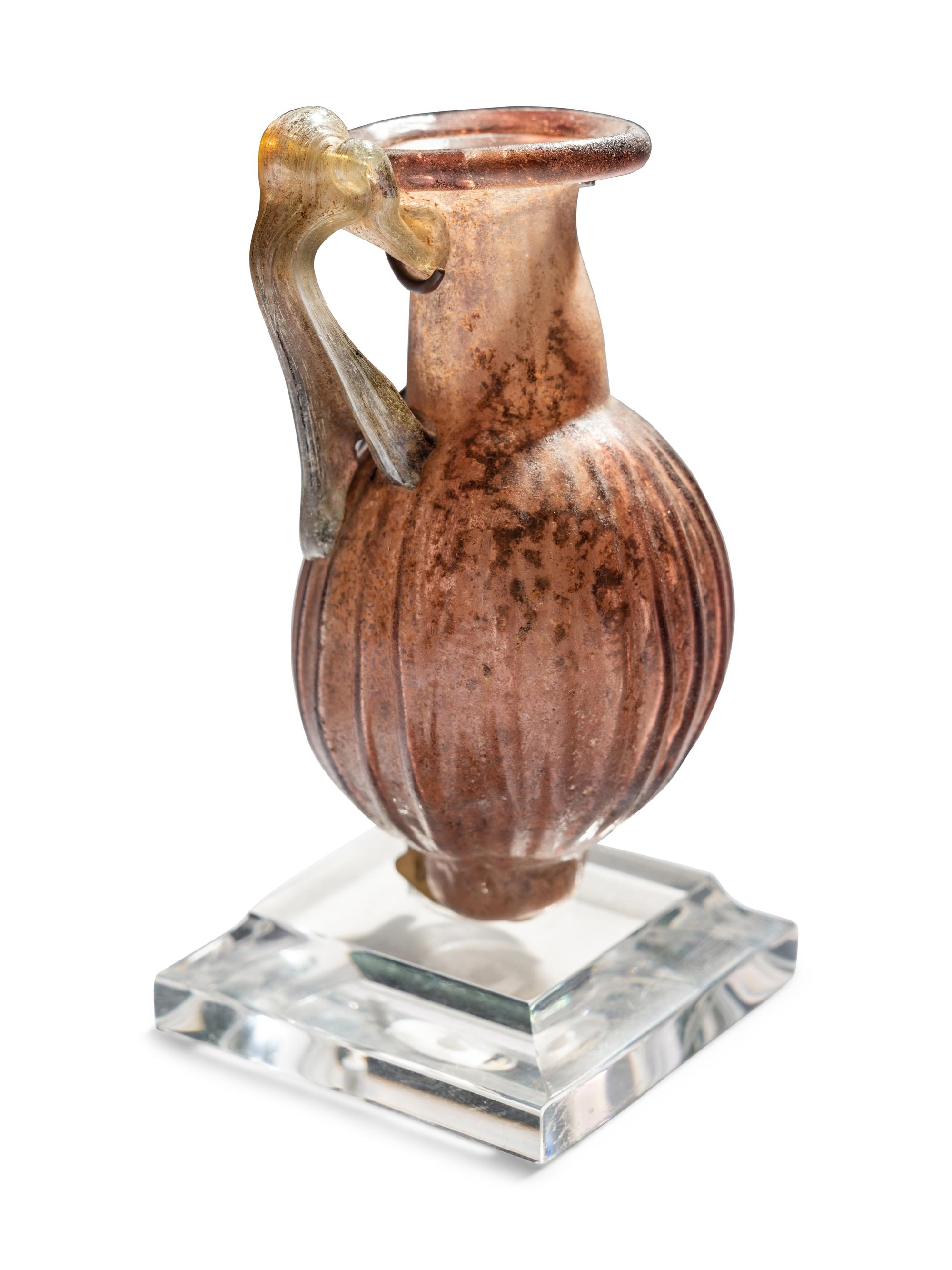 A Roman Purple Glass Jug