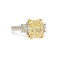 FANCY LIGHT YELLOW DIAMOND AND DIAMOND RING