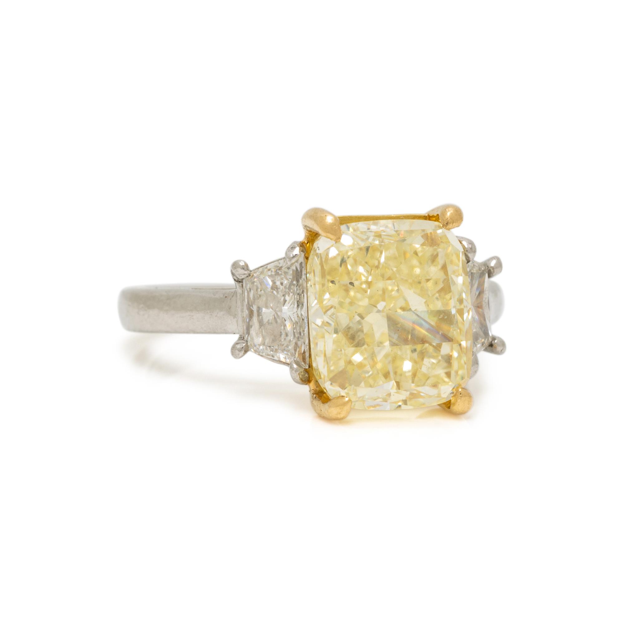FANCY LIGHT YELLOW DIAMOND AND DIAMOND RING