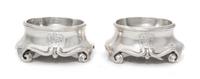 A Pair of French Ancien Regime Trencher Salts, Jean Lacere, Toulouse, Mid-18th Century, each raised on S-scroll feet.