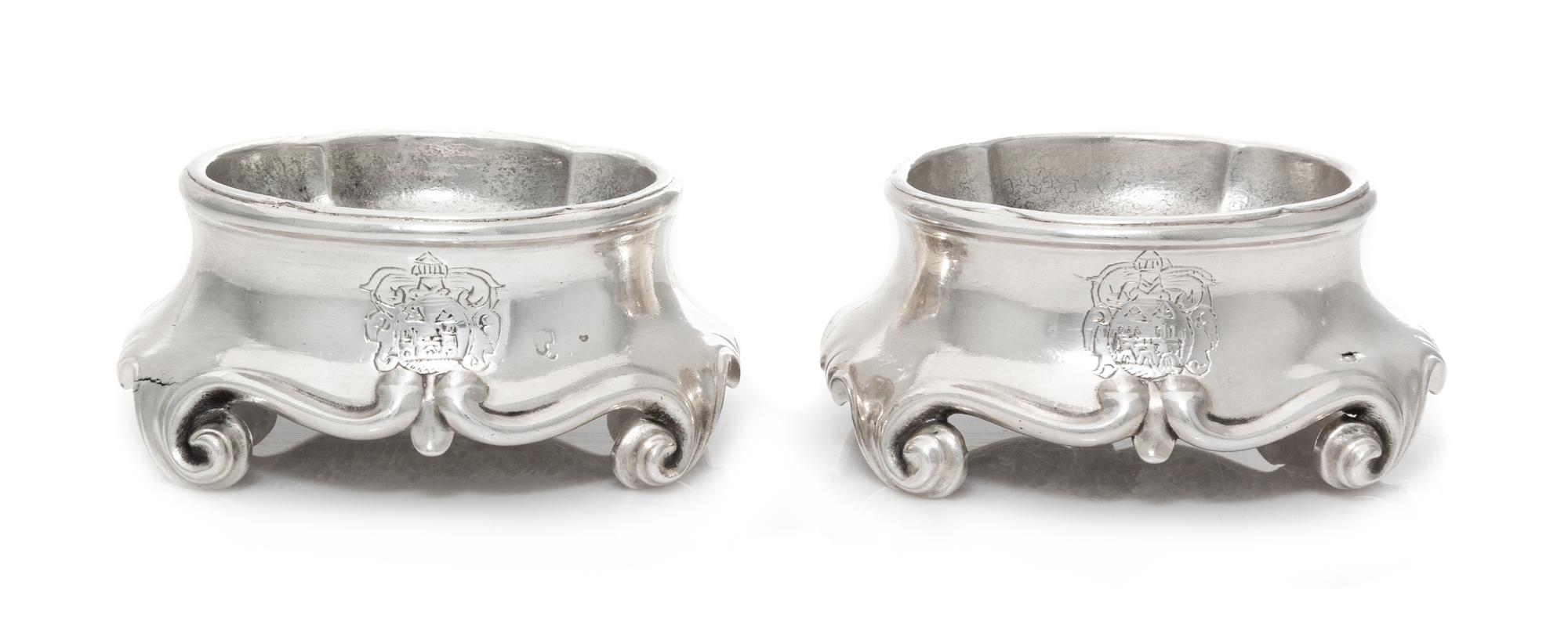 A Pair of French Ancien Regime Trencher Salts, Jean Lacere, Toulouse, Mid-18th Century, each raised on S-scroll feet.