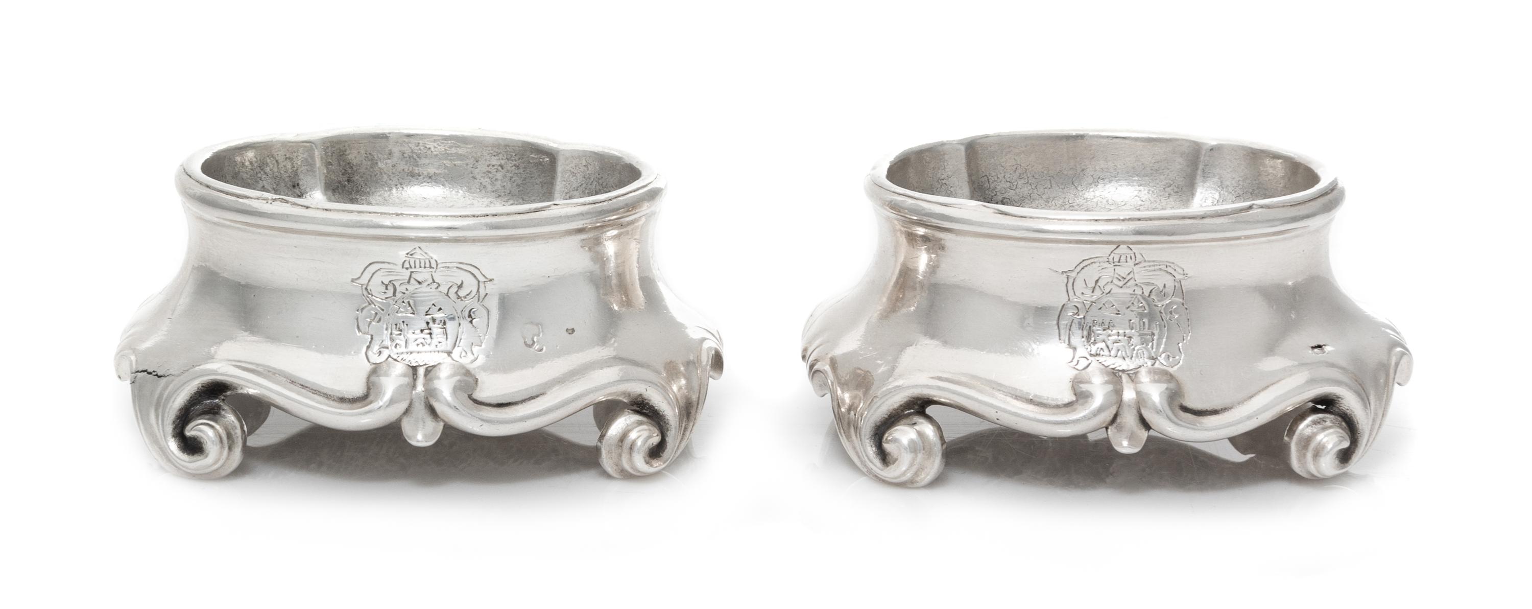A Pair of French Ancien Regime Trencher Salts, Jean Lacere, Toulouse, Mid-18th Century, each raised on S-scroll feet.