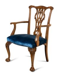 A Set of Ten George III Style Carved Mahogany Dining Chairs