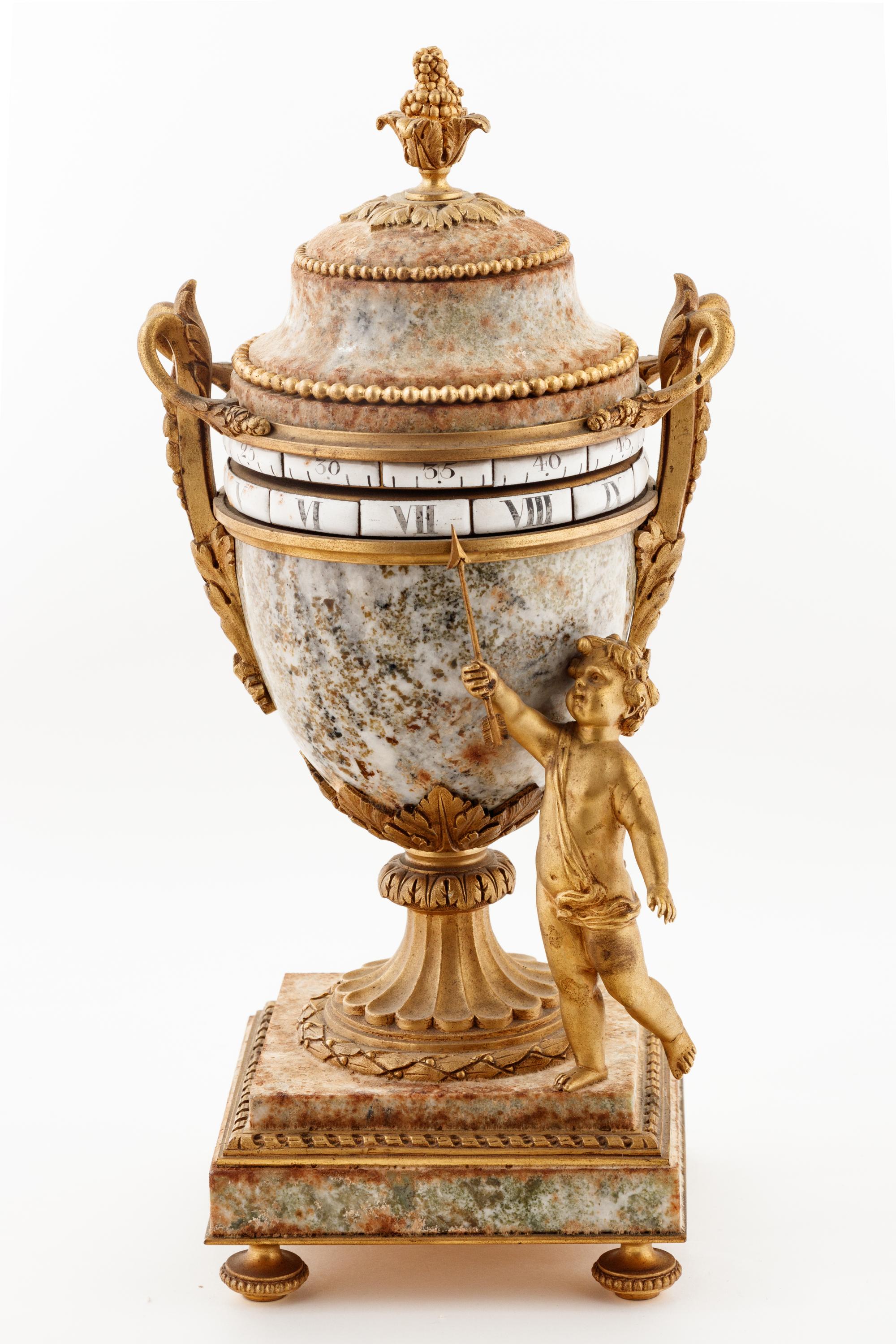 A Louis XVI Style Gilt Bronze and Marble Annular Clock