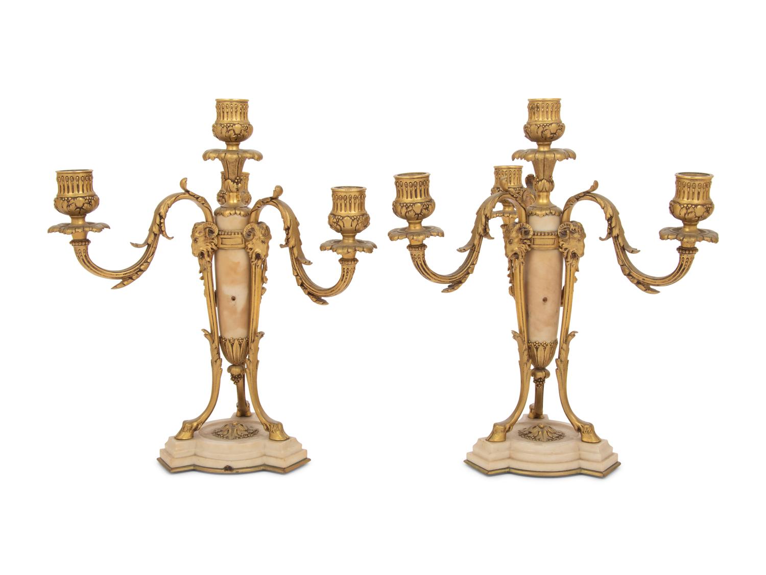A Pair of French Gilt Bronze and Alabaster Four-Light Candelabra