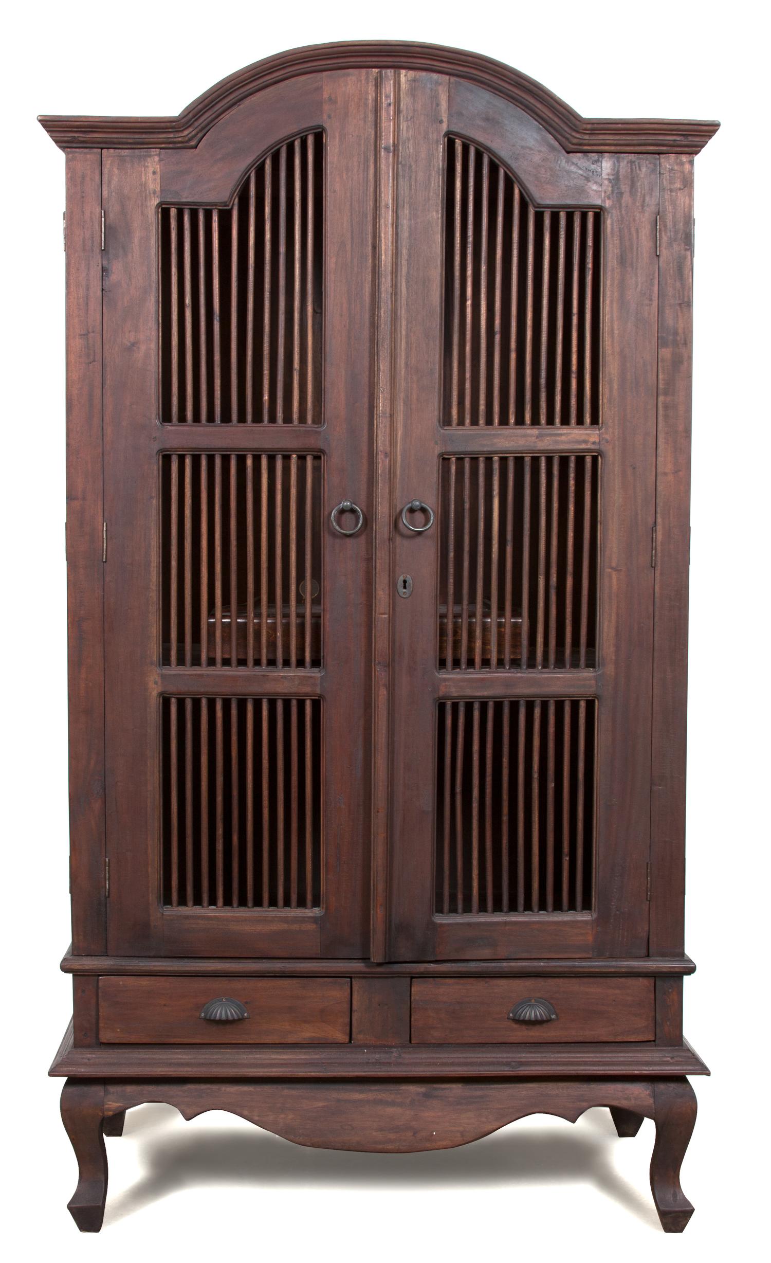 A Javanese Teak Two Door Cabinet Height 78 x width 40 1/2 x depth 23 inches. — 20TH CENTURY