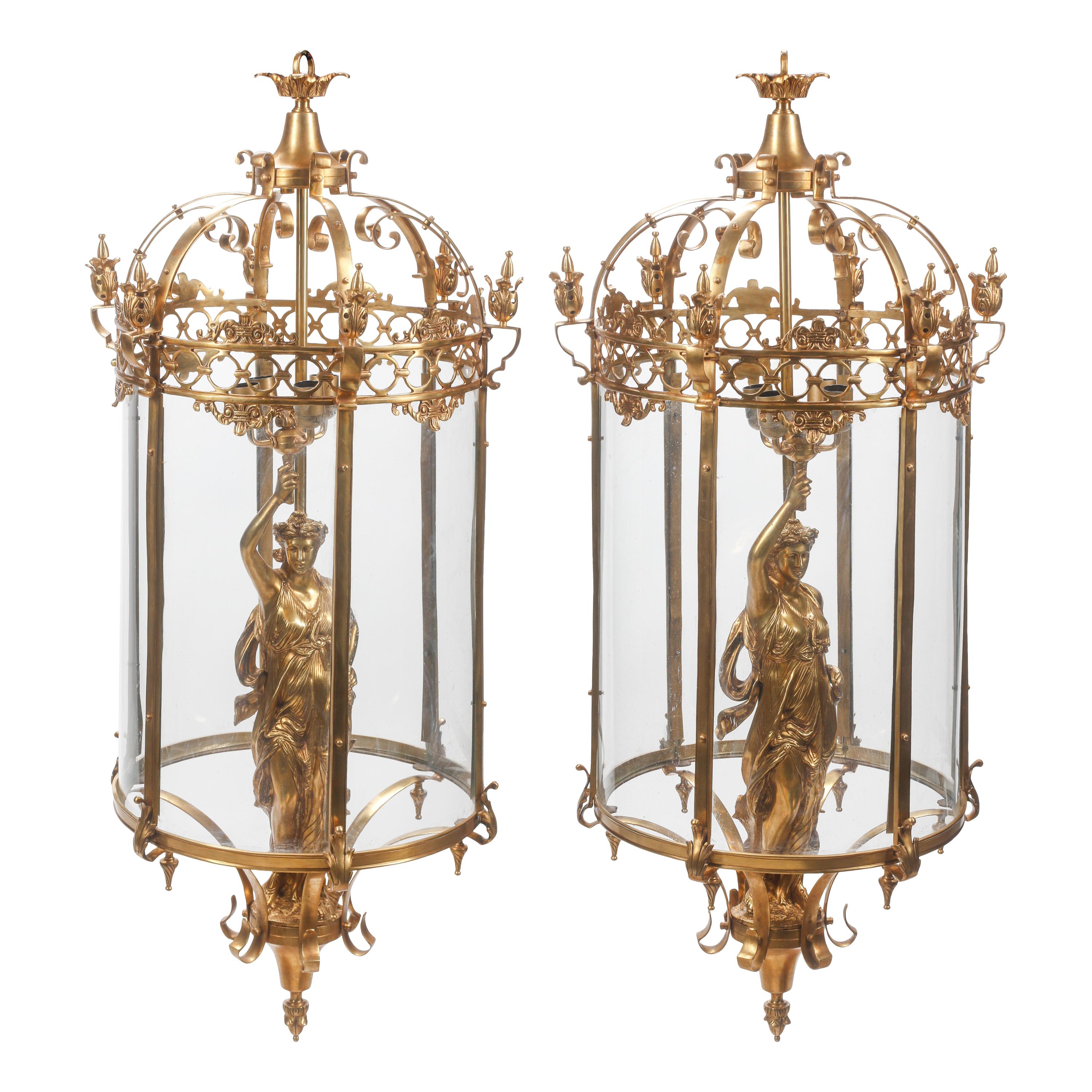 A Pair of Louis XV Style Gilt Bronze Figural Lanterns