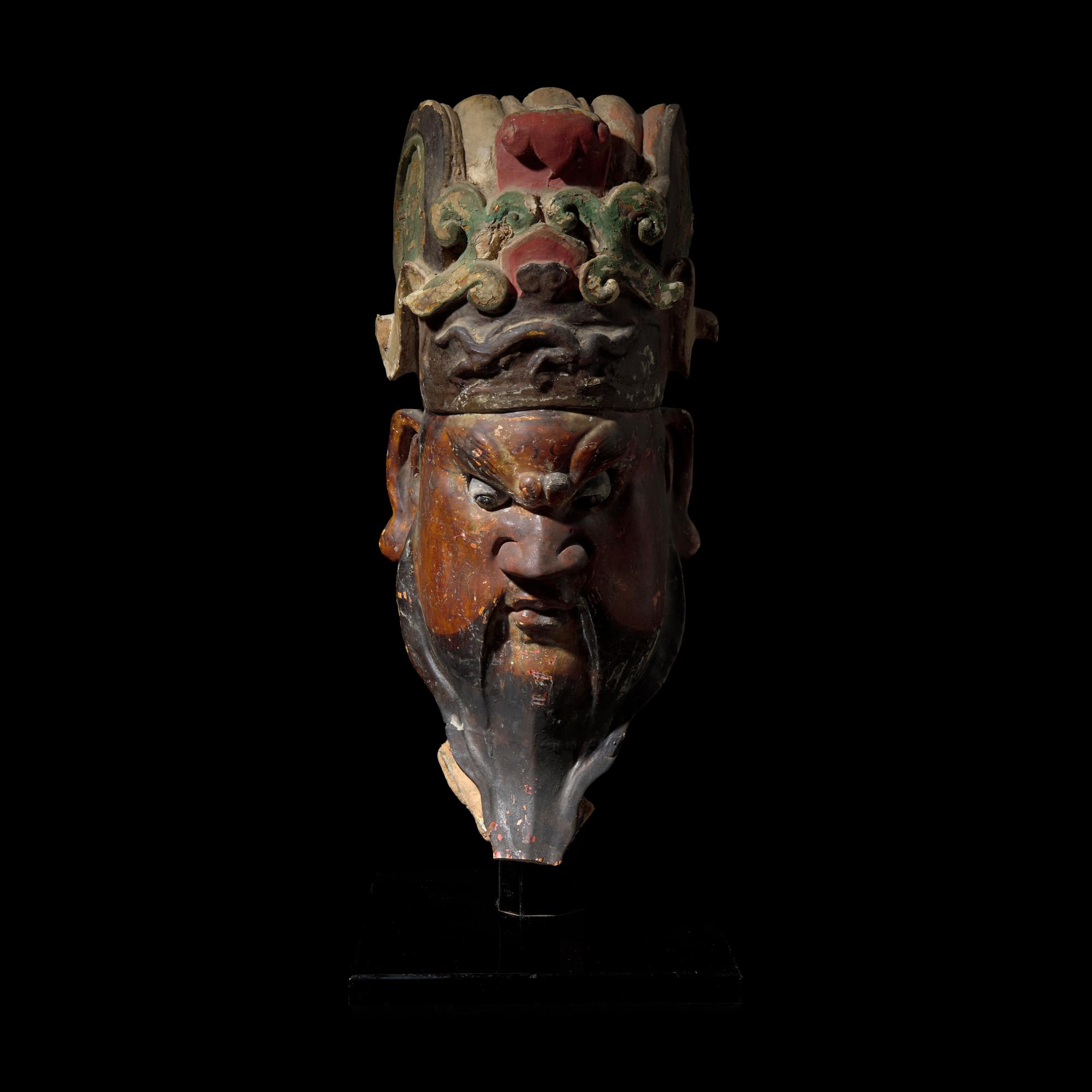 A Chinese Polychromed Stucco Head of a Celestial Judge, Ming Dynasty 明 彩繪泥塑天王首