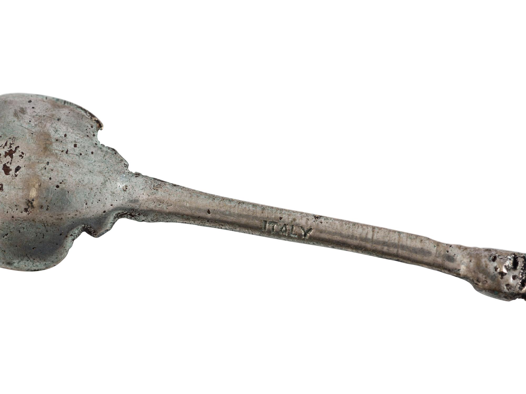 Twenty-Two Silver, Gilt and Enamel Souvenir and Serving Spoons and a Fork