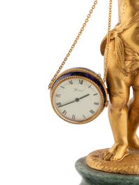 A Continental Gilt Bronze and Marble Figural Clock