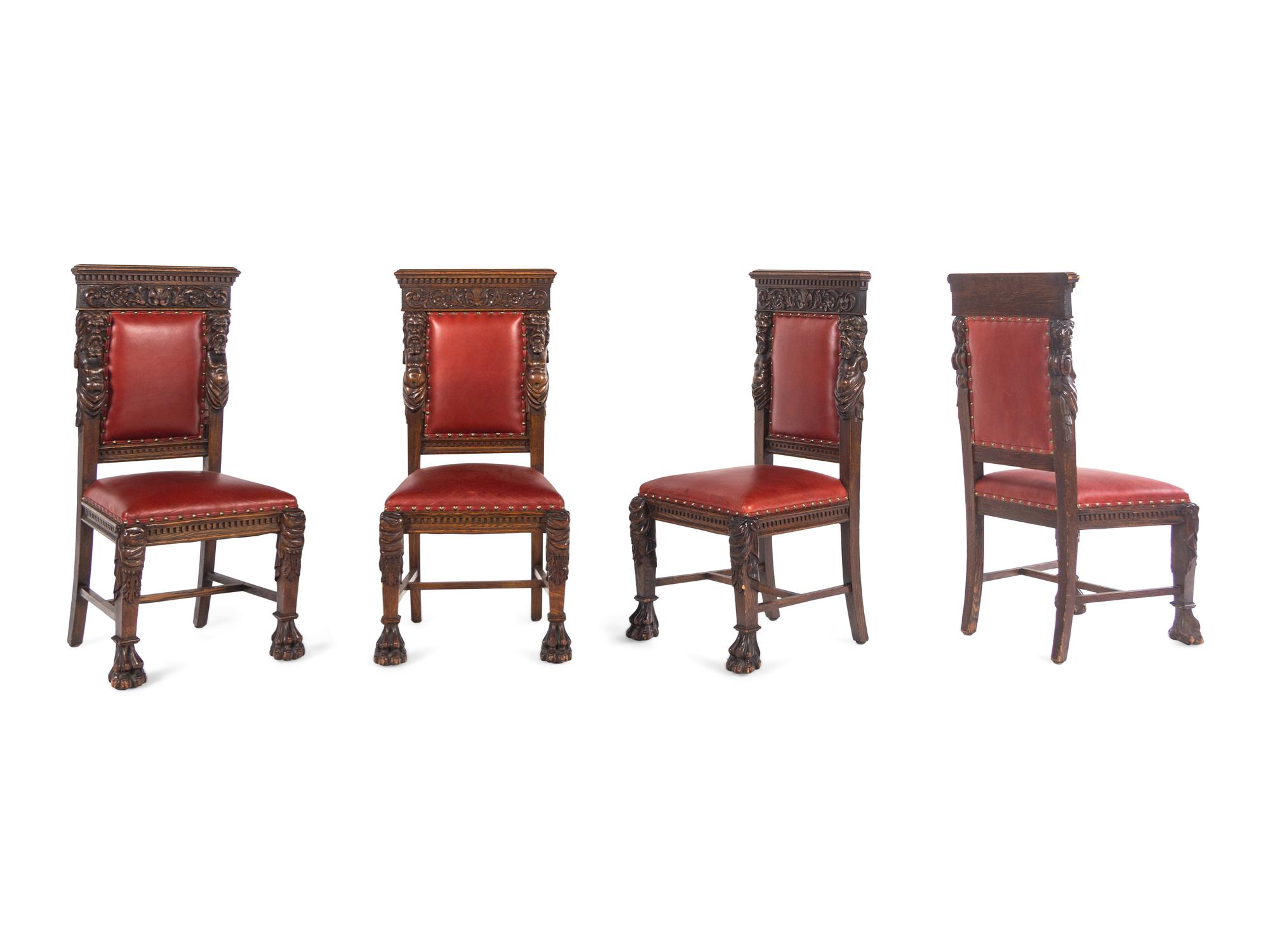 A Set of Eight R.J. Horner Carved Oak Man of the Mountain Dining Chairs