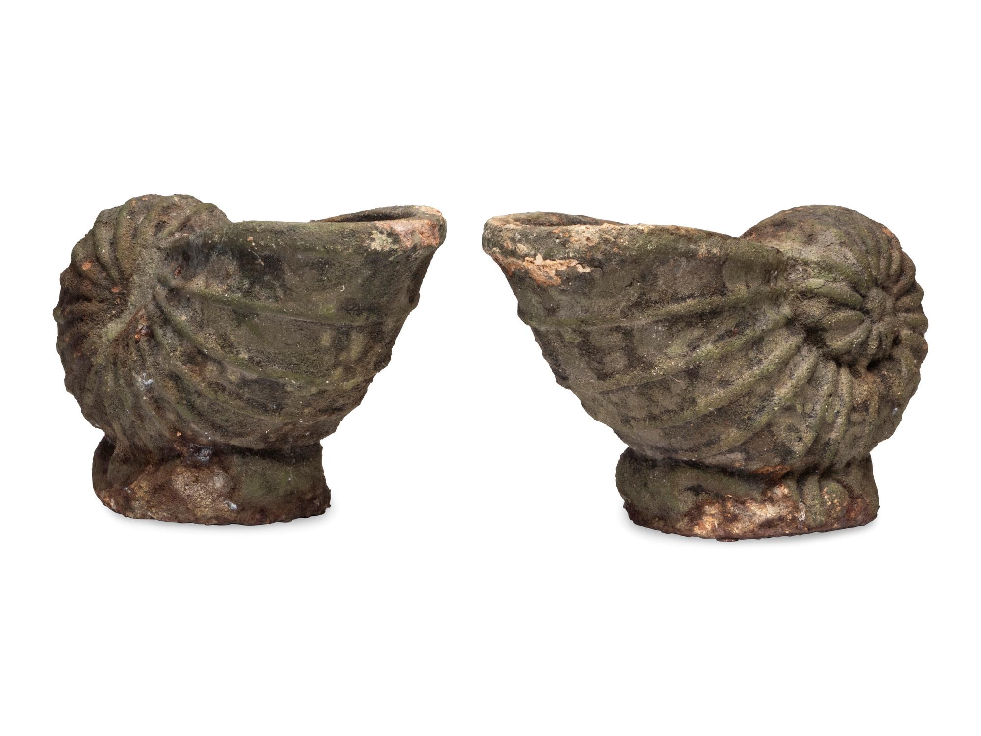 A Pair of Cast Stone Nautilus Jardinières