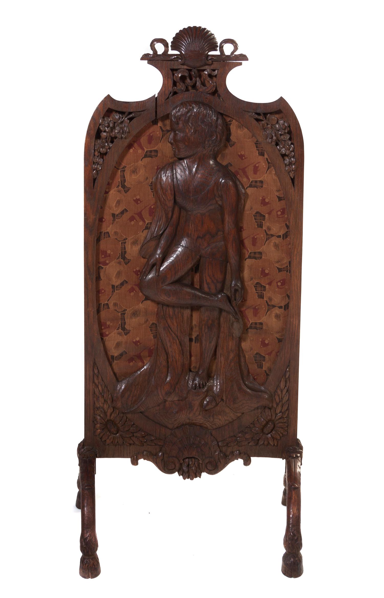 An English Victorian Oak Firescreen, Height 53 1/2 inches.