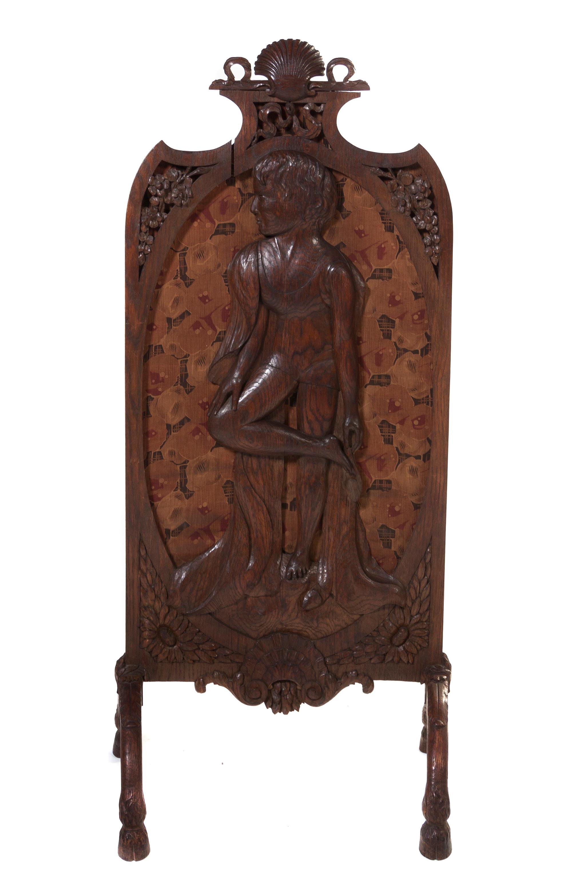 An English Victorian Oak Firescreen, Height 53 1/2 inches.