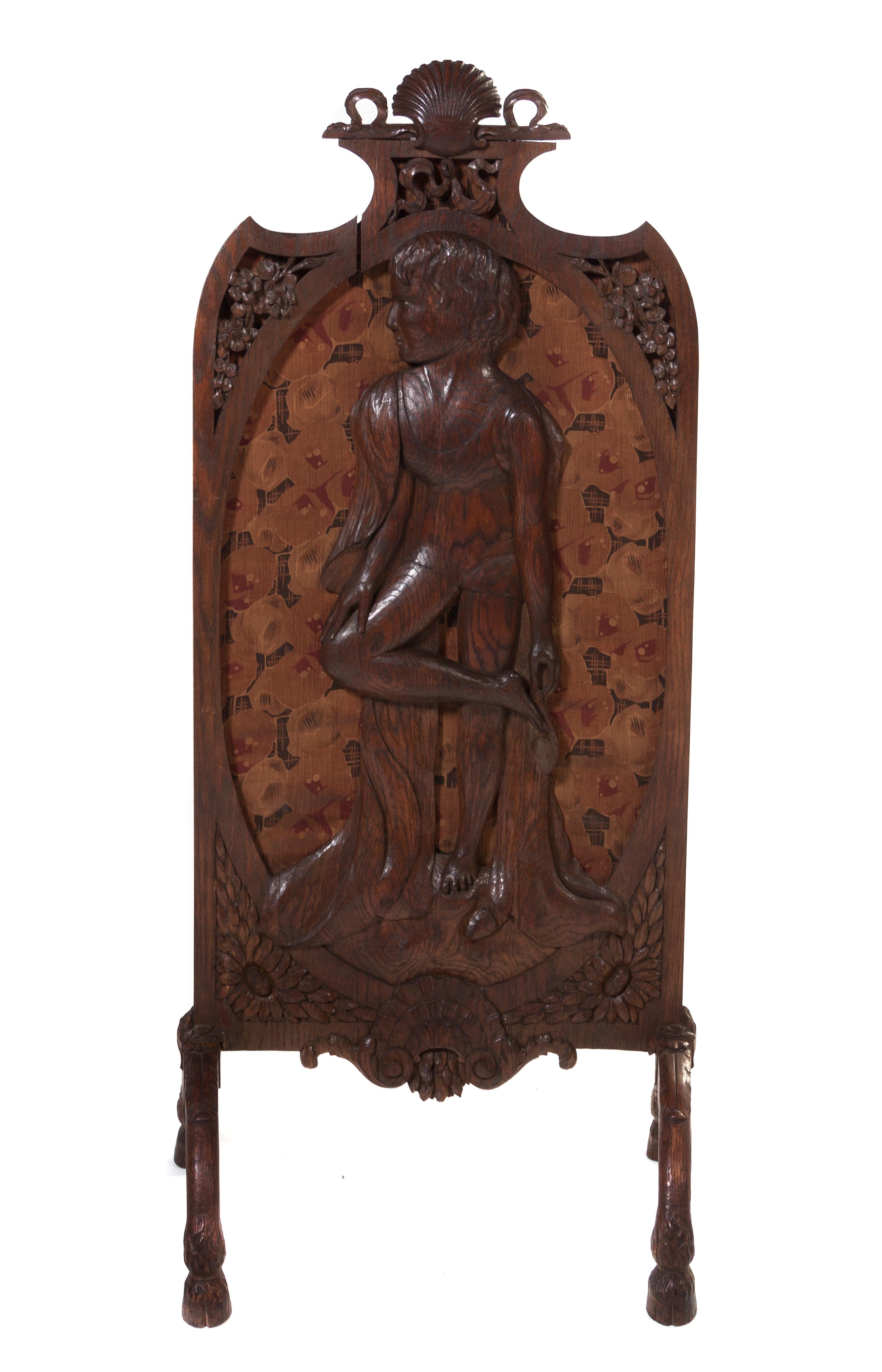 An English Victorian Oak Firescreen, Height 53 1/2 inches.