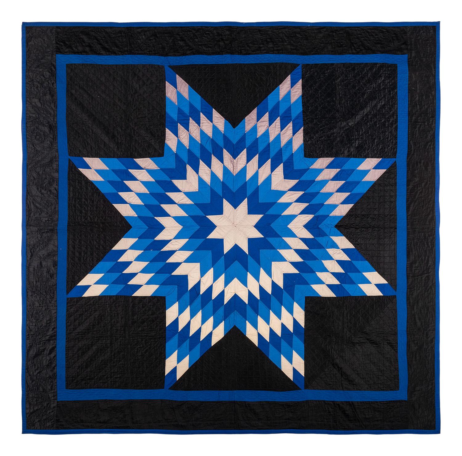 An Amish Eight Point Star Pieced Cotton and Satin Quilt