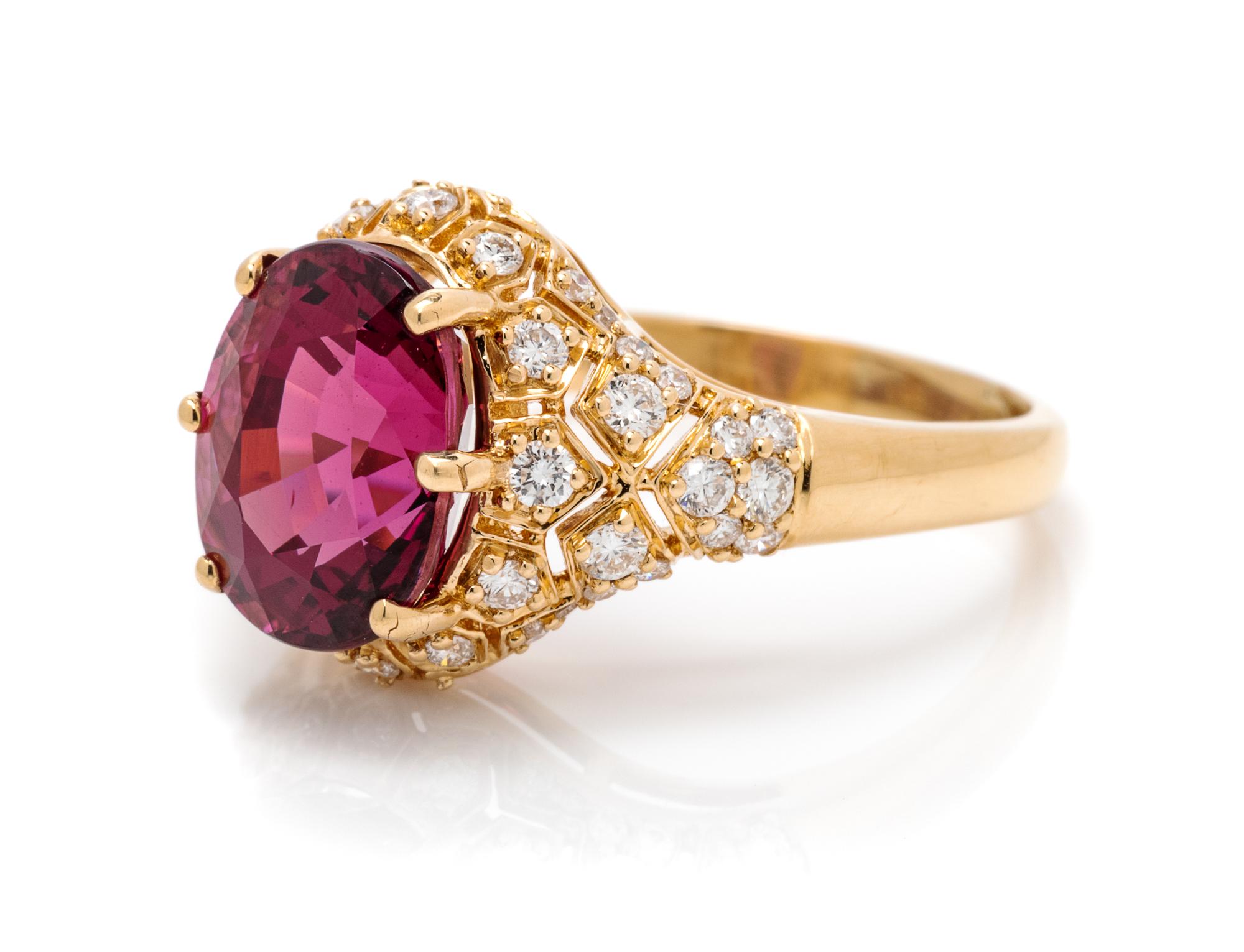 An 18 Karat Yellow Gold, Garnet and Diamond Ring, 4.30 dwts.