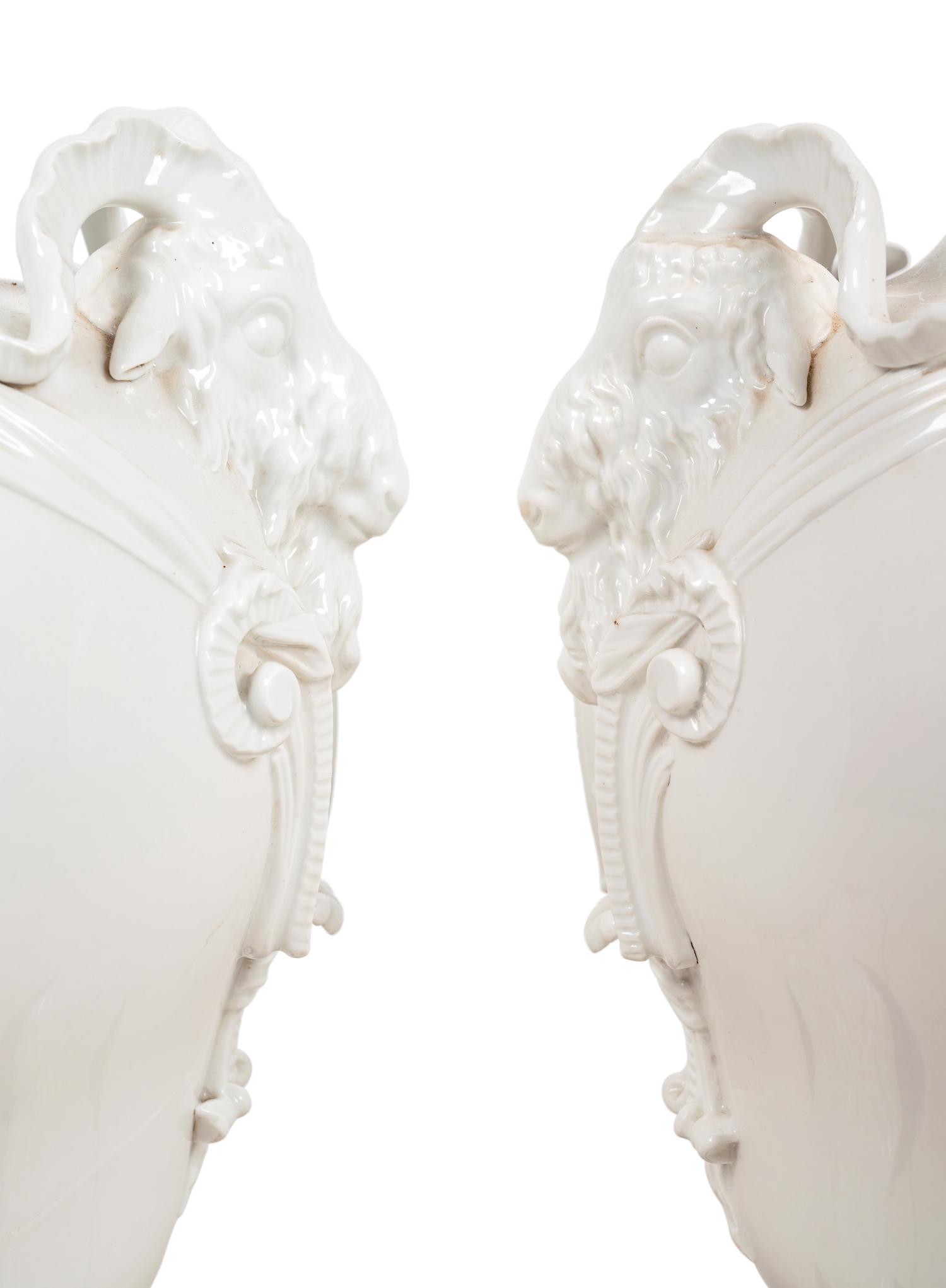 A Pair of German Blanc-de-Chine Porcelain Urns Mounted as Lamps