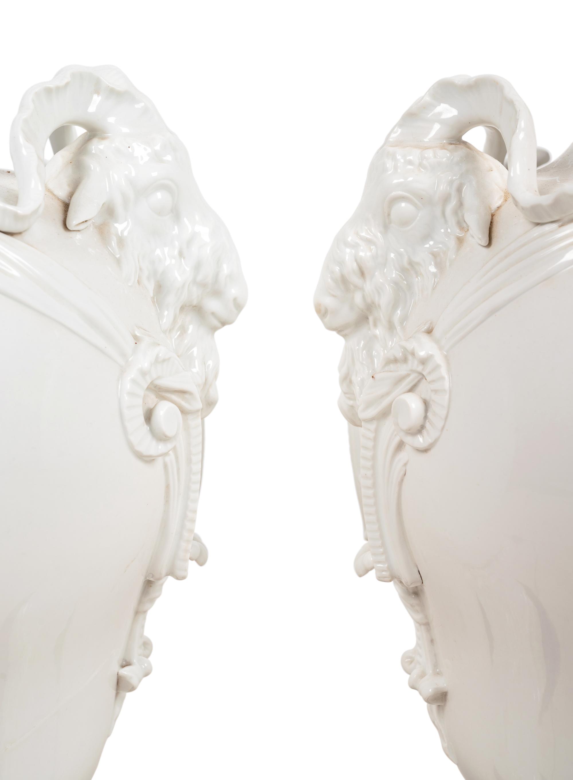 A Pair of German Blanc-de-Chine Porcelain Urns Mounted as Lamps