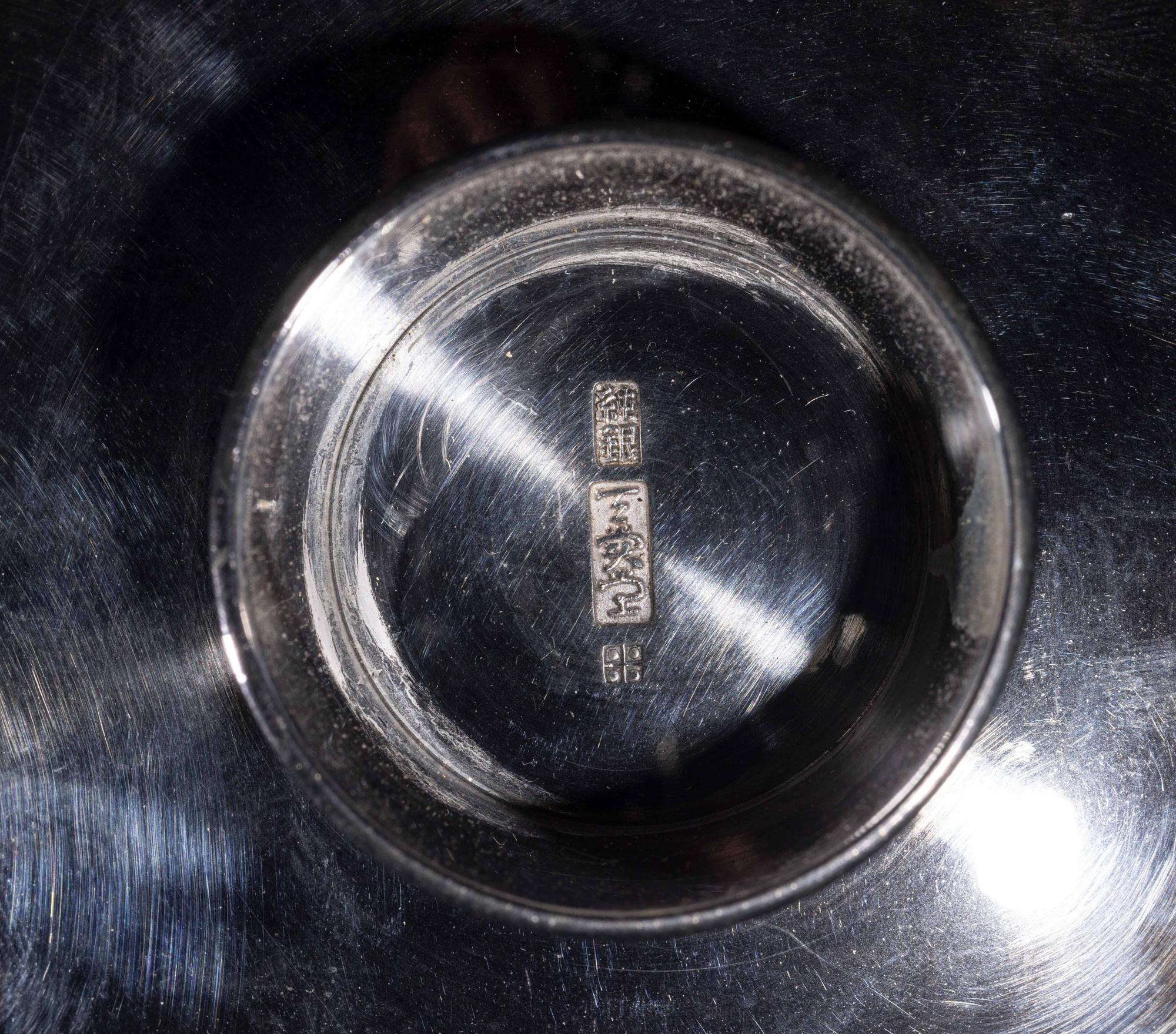 A Set of Three Japanese Silver Sake Cups