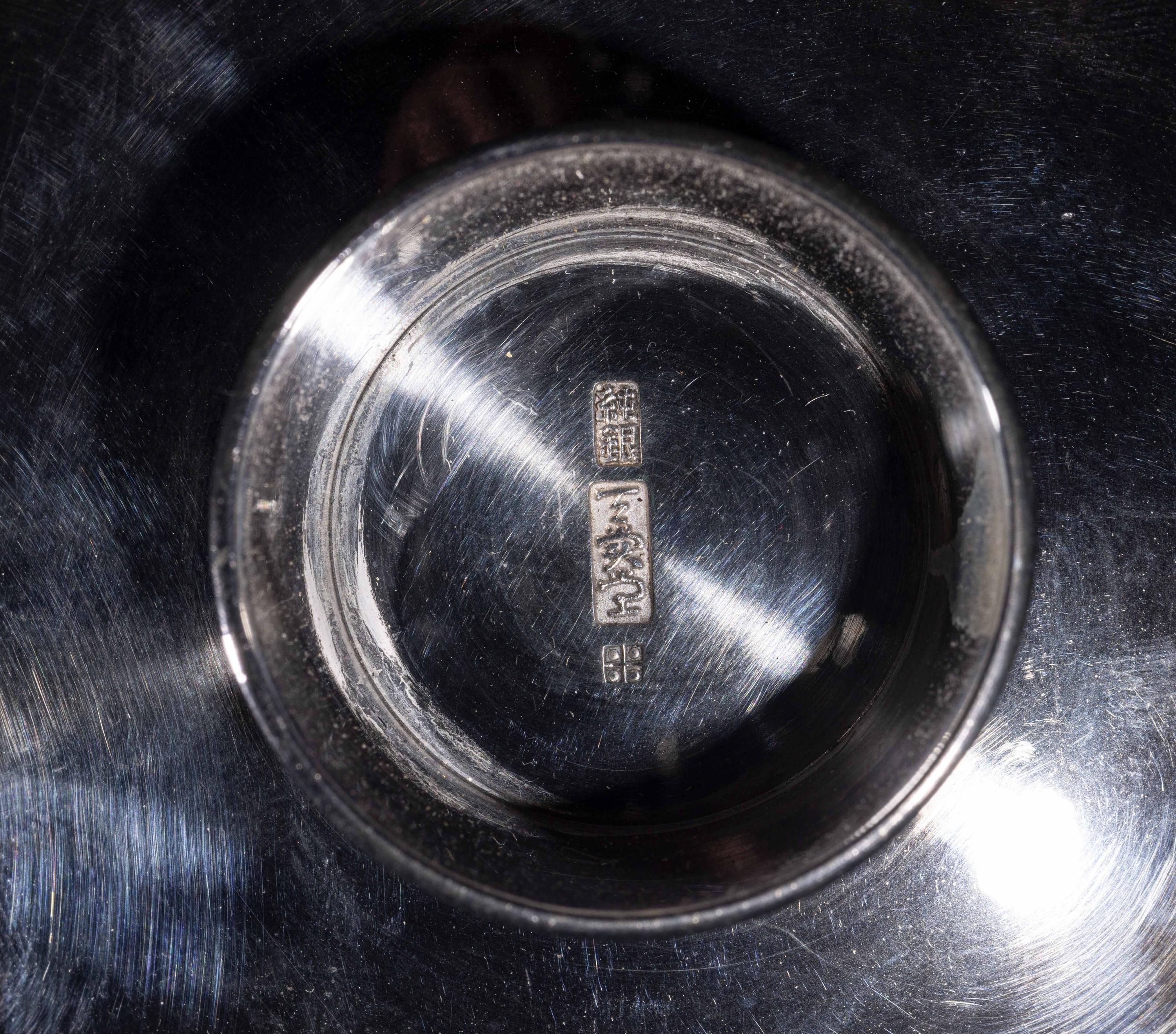 A Set of Three Japanese Silver Sake Cups
