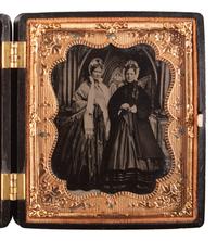 [EARLY PHOTOGRAPHY]. Sixth plate tintype featuring two elegant ladies.