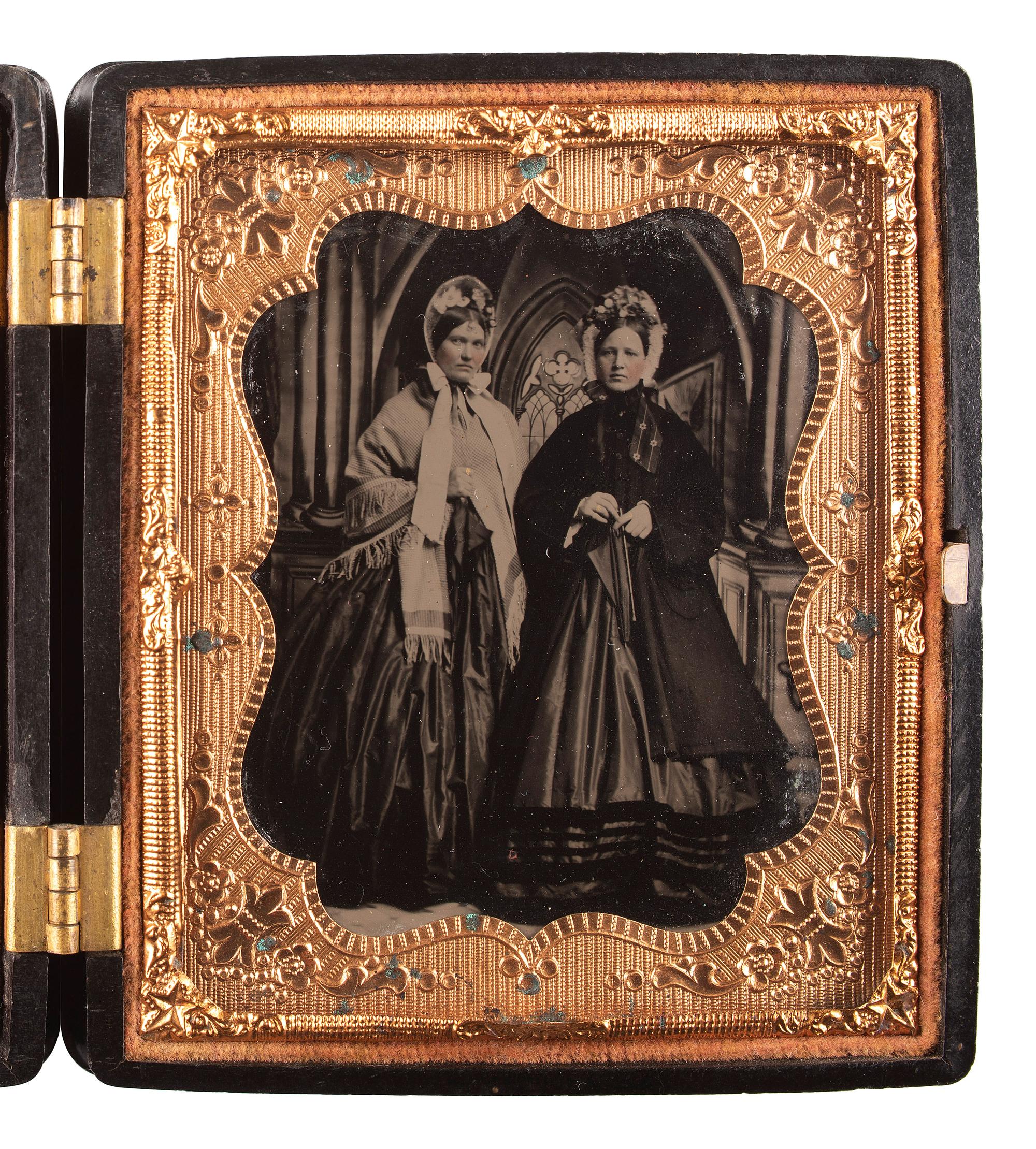 [EARLY PHOTOGRAPHY]. Sixth plate tintype featuring two elegant ladies.
