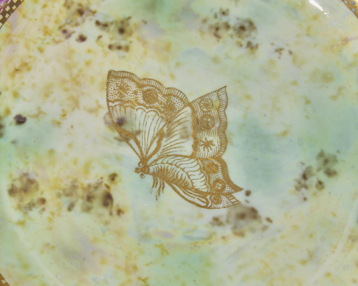 A Set of Four Wedgwood Lustreware Plates
