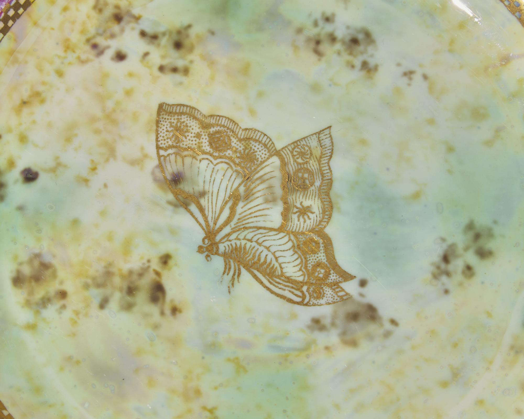 A Set of Four Wedgwood Lustreware Plates