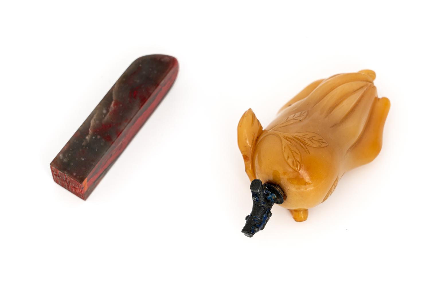 A Chinese Bloodstone Seal and A Yellow Hardstone Snuff Bottle