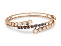 A 14 Karat Yellow Gold, Cultured Pearl and Sapphire Bangle Bracelet,