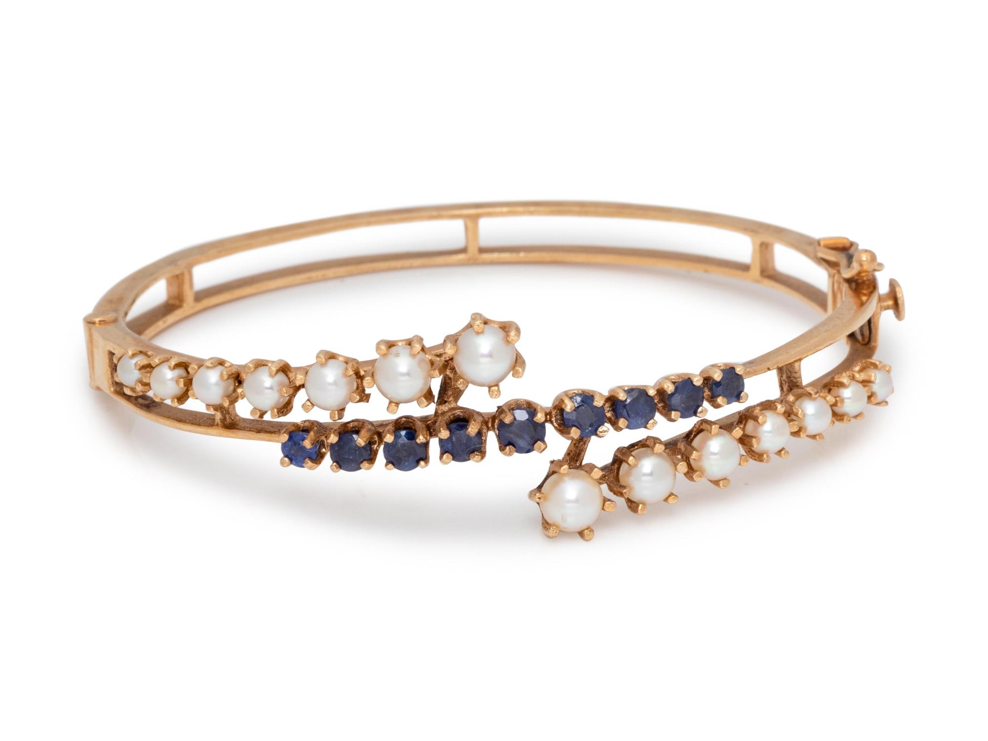 A 14 Karat Yellow Gold, Cultured Pearl and Sapphire Bangle Bracelet,